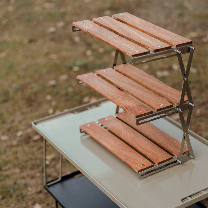 Mountaineering Outdoor Camping Rack Portable Storage Rack Three Layer Rack With Foldable Picnic Camping Barbecue Folding Table V.I.P Digital Presence The Snag Bin