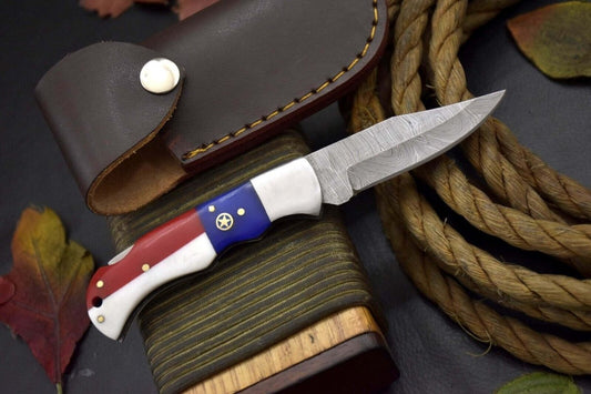 Handcrafted Damascus Steel Pocket Knife – Texas Flag Handle & Leather Sheath | Collectible EDC Gift - The Snag Bin
